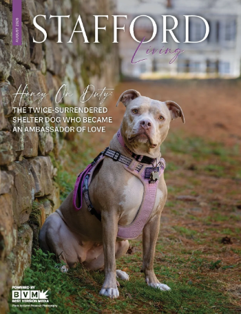 Stafford Living magazine cover — August 2026 — featuring Honey On Duty: The Twice-Surrendered Shelter Dog Who Became An Ambassador of Love