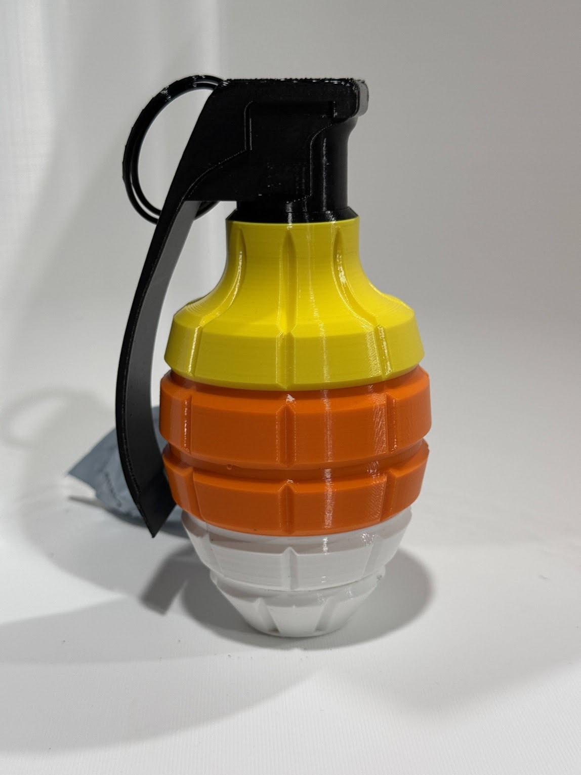 Candy Corn Poop Bag Dispenser front view showing yellow, orange, and white color blocks
